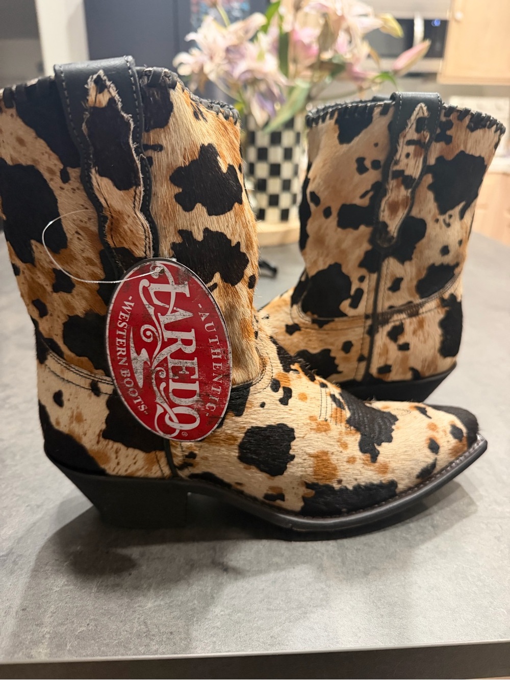 Laredo Cowhide Print Western Ankle Boots in Black & Tan
